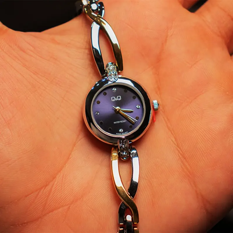 Q&Q Blue Dial Two-tone Srone Ladies Watch- F06A-004PY